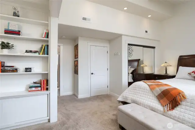 primary closets, one walk-in and one behind the mirror doors.  Bathroom to the left of the walk-in closet.