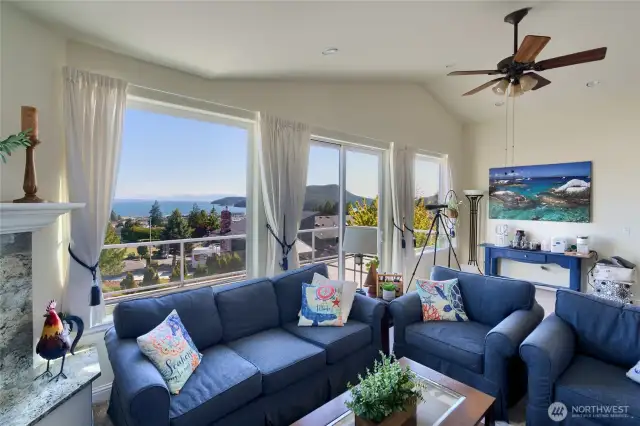 upstairs family room with beautiful views and deck for entertaining or just enjoying the sun.