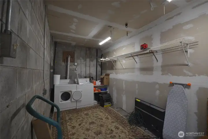 This is the laundry for the upper floor of the main home. Located in lower lower level of the garage.