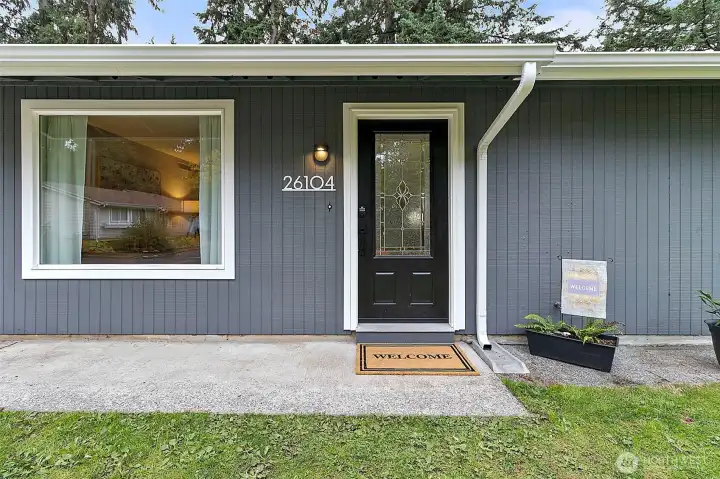 Two car driveway with a one car garage and RV parking.