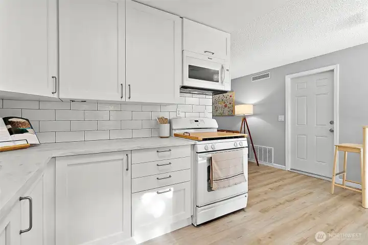 Kitchen offers storage.
