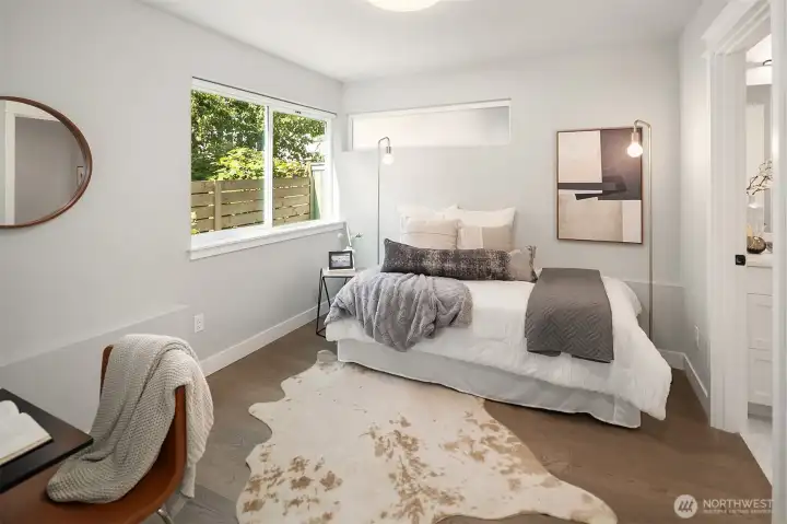 Lower level bedroom with en suite bath.