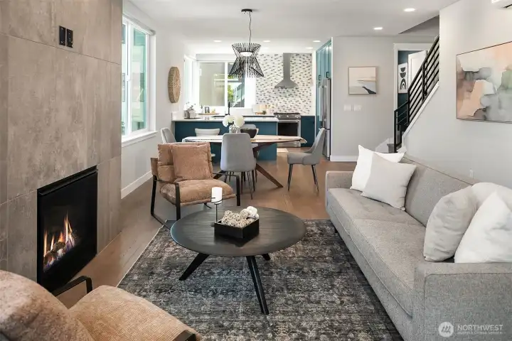 Living room view to dining and kitchen.