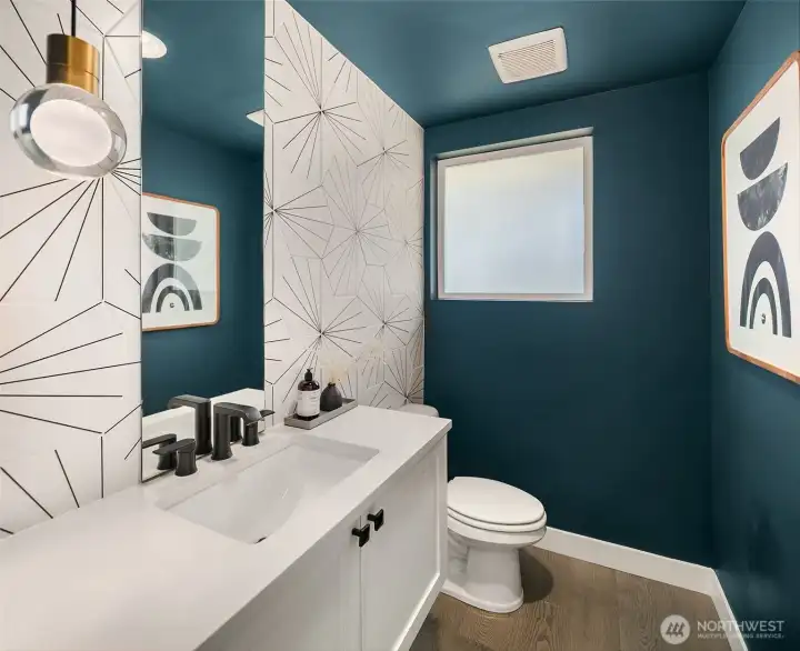 Powder bath for main floor use. Super cute tile.