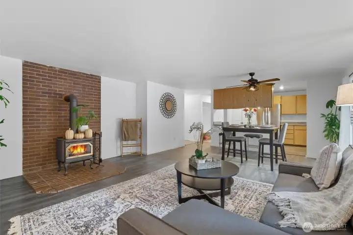 Open and perfect for entertaining! Complete with a wood stove for those cozy nights.