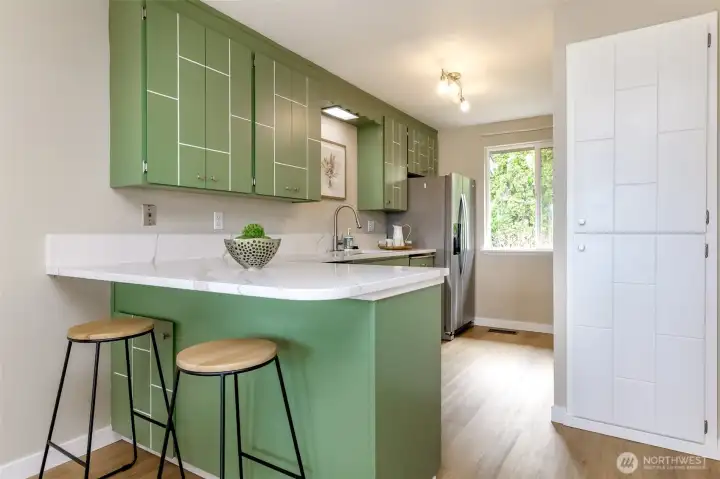 Breakfast bar with seating for two.