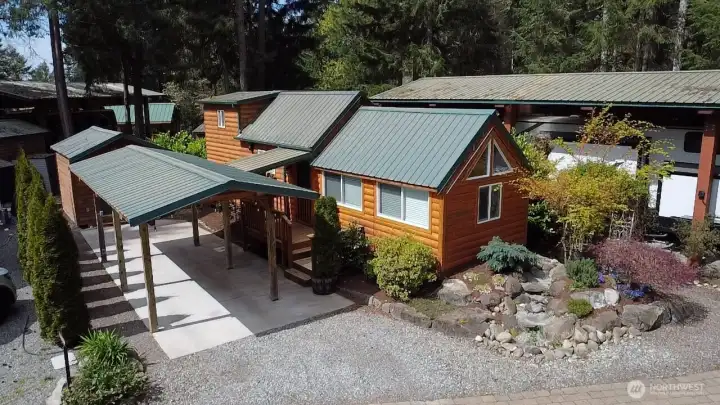 44 HEMLOCK CABIN WITH CARPORT AND SHED, WASHER/DRYE