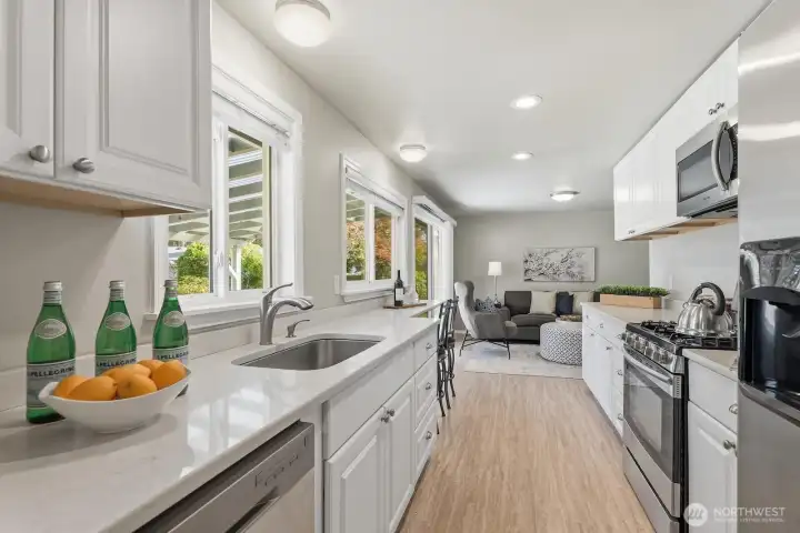 Newer kitchen cabinets & quartz counters, Tastefully refreshed kitchen