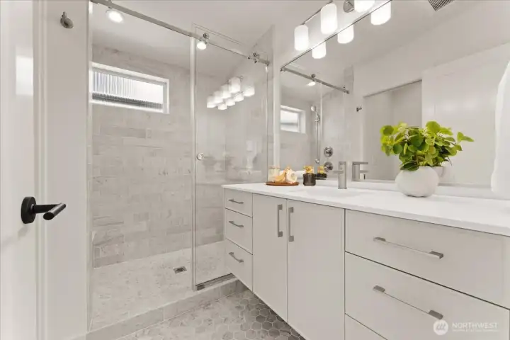 Spa-like primary bathroom. Photo of model unit, 4118. Finishes may vary, buyer to verify.