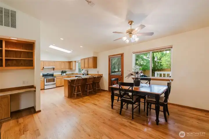 Great open concept dining, family room with kitchen