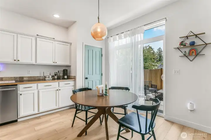Eat-in kitchen with pantry beyond. Eat-in kitchen with pantry beyond.