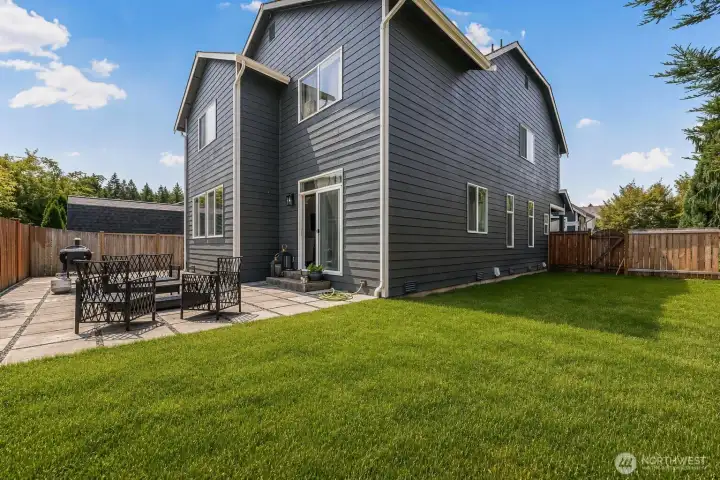 Back and side yard view. Recently seeded lawn- this lawn is virtually staged to show you what it will look like once grass grows in. Back and side yard view. Recently seeded lawn- this lawn is virtually staged to show you what it will look like once grass grows in.
