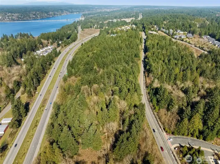 With the preliminary plat work well underway and architectural sketches available, this 11+ acre parcel is poised for your vision to transform it into a stunning, fully developed property with partial views of Henderson Bay and the Olympic Mountain Range. With the preliminary plat work well underway and architectural sketches available, this 11+ acre parcel is poised for your vision to transform it into a stunning, fully developed property with partial views of Henderson Bay and the Olympic Mountain Range.