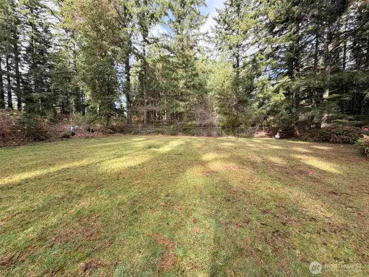 Enjoy a generous 2.22-acre lot with lush greenery Enjoy a generous 2.22-acre lot with lush greenery