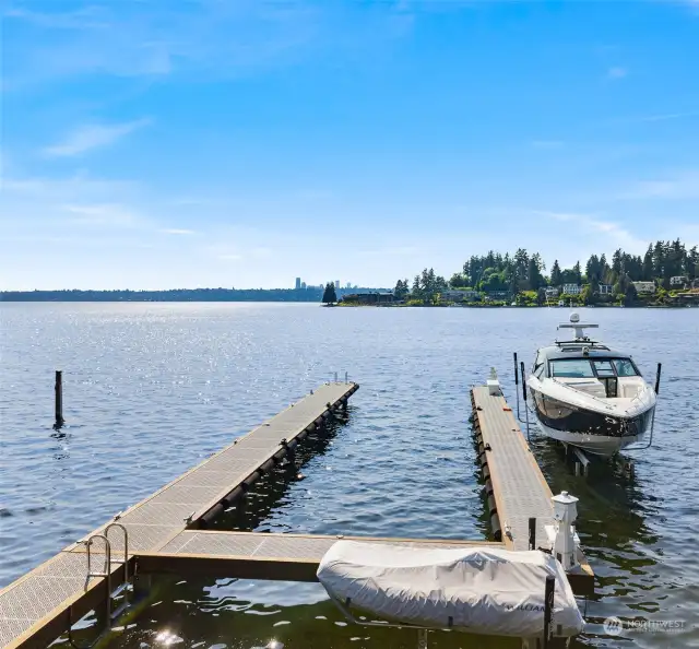 A newly constructed boat dock (2019) with two hydraulic boat lifts awaits, capable of securely mooring yachts up to 65 feet in length.