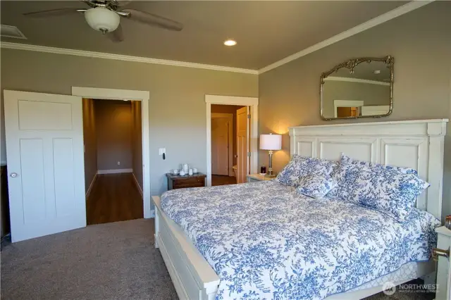 Master suite with bathroom and walk-in closet includes a soaking tub and huge tile shower with a toilet closet and dual garnite vanity.