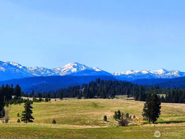 Photo taken from property on the top looking to the west...imagine your new home with high ceilings and picture windows looking out to this view!!! That is the Stuart Mountain Range & Cascades off in the distance and you are overlooking Hidden Valley and Teanaway Valley. So incredibly beautiful!