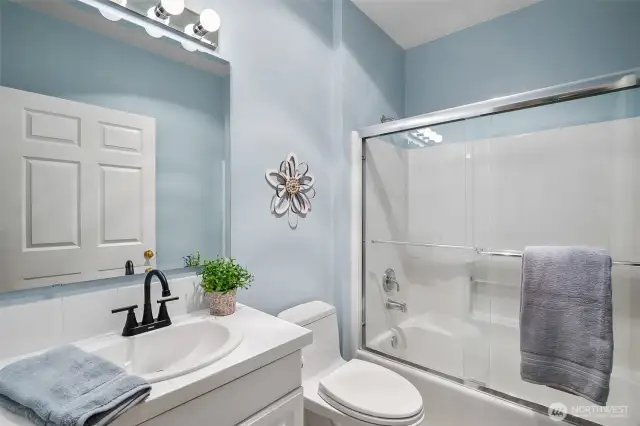 Guest bath, just off bedroom 2 and den
