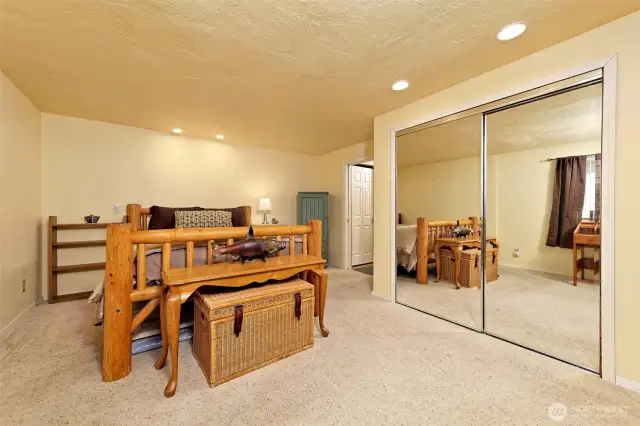 Just part of this luxurious primary bedroom-there's way more