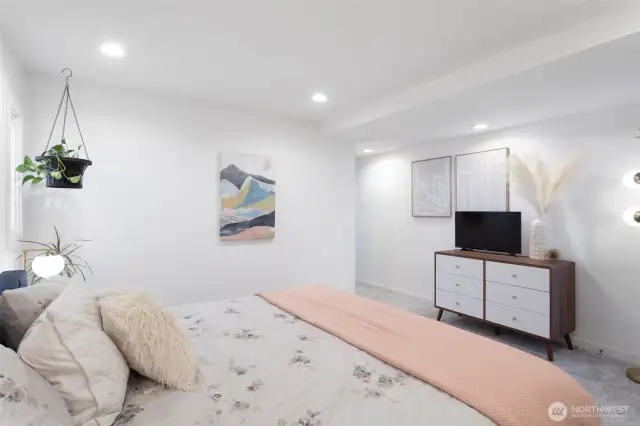 Step out of bed and let your toes sink into the luxury of brand new, extra thick padded carpeting in the primary bedroom!