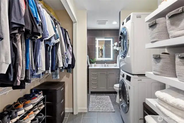 Laundry is conveniently located near the primary bedroom closet and en-suite bath.