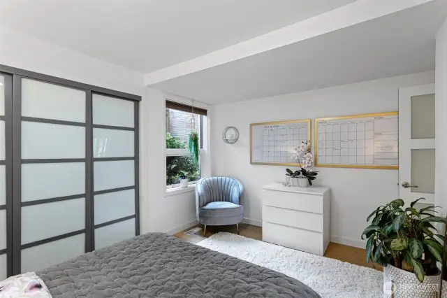 The second bedroom boasts a wall of closets and plenty of room to keep everything tidy and well organized.