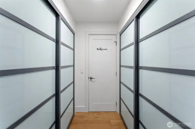 Hello closet space! The hallway to the main bathroom is lined with oodles of additional storage!