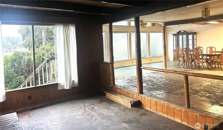 Sunken living room and open concept main level area.