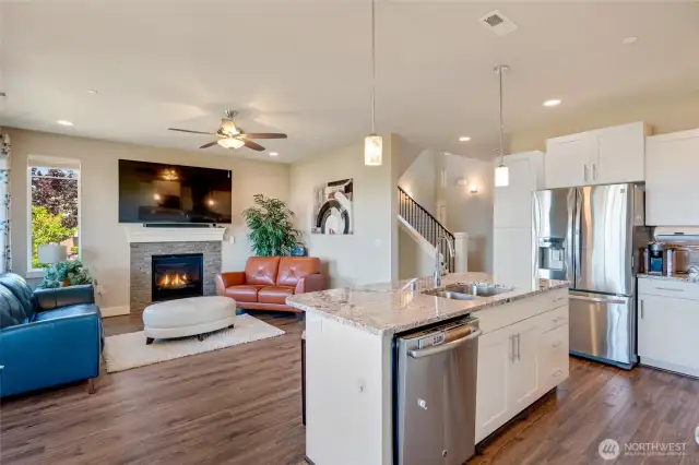 Kitchen opens to living area for seamless entertaining.