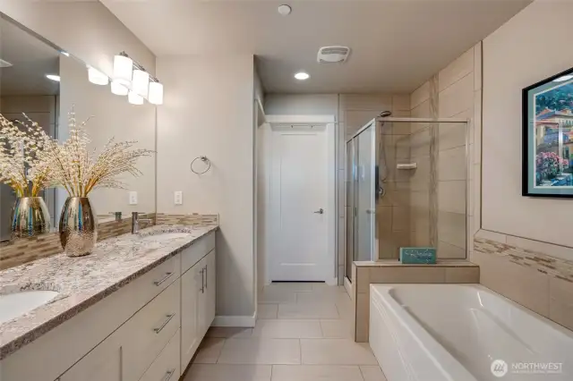 Dual vanities, soaking tub & walk-in shower—relax in style!