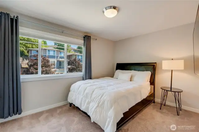 Spacious secondary bedroom with ample closet space.