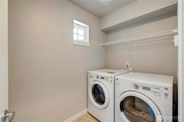 Convenient upper level laundry room.