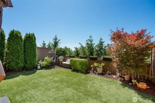 Fully fenced backyard for privacy and pets.