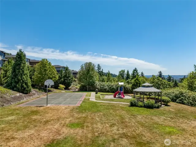 Enjoy community amenities: trails, park, and sports court.