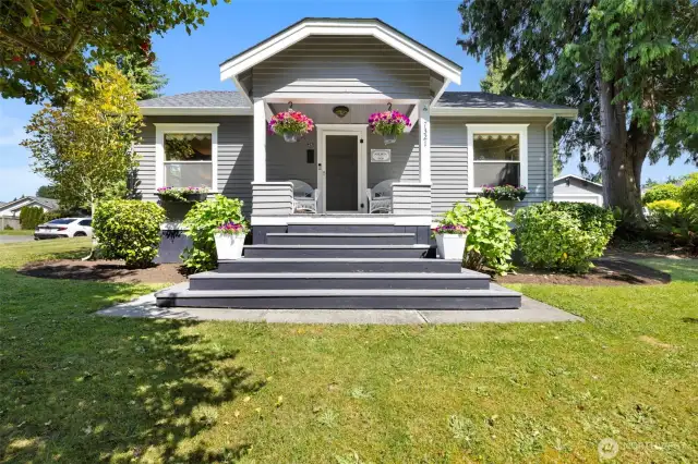 Welcome to the Mons and Line Nilson House—where timeless 1920s charm meets thoughtful updates on a beautifully landscaped corner lot in the heart of Cedarcrest.