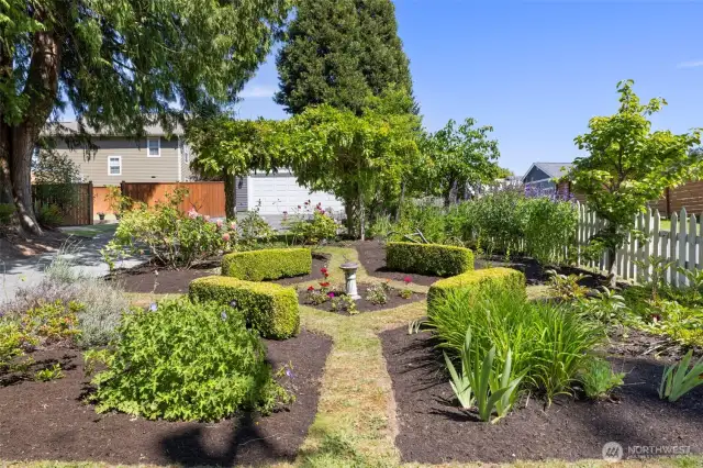 A cozy English garden full of character and color.