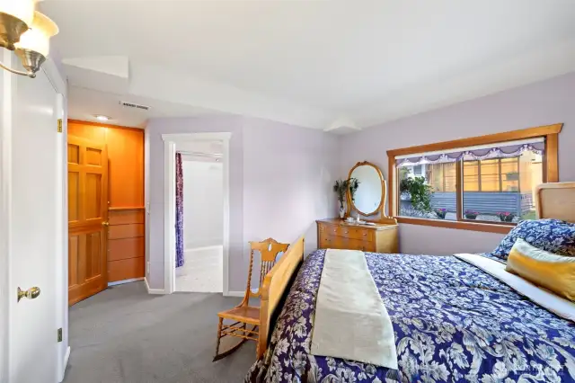 Primary suite features dual closets and built-in drawers—beautiful and efficient.