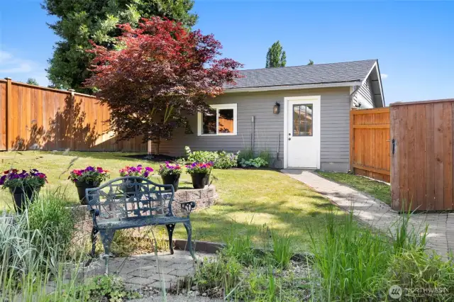 Access to the backyard from your garage!  Also cedar fenced backyard!