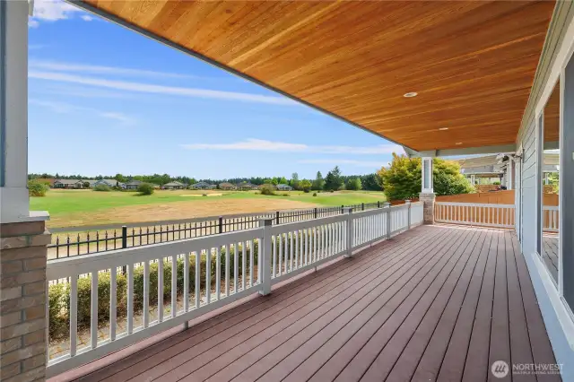 Large covered Trex Deck with stunning territorial and 3 Fairway views. All complimented by a paved patio and side yard sitting area.