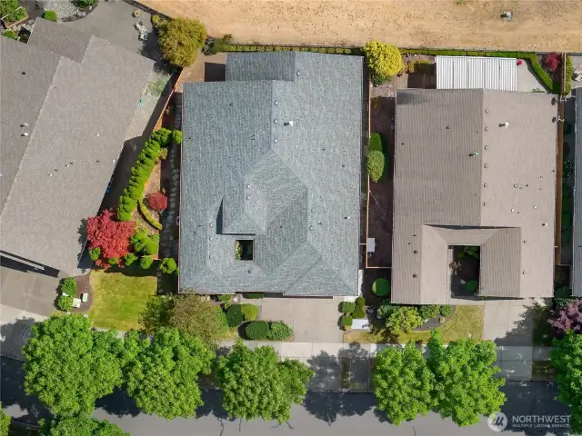 Large covered Trex Deck with stunning territorial and 3 Fairway views. All complimented by a paved patio and side yard sitting area.