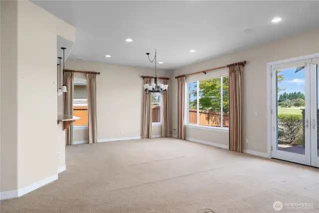 Natural light filled Great Room and Dining Room with 10 Ft Ceilings throughout.