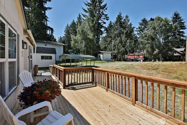 New front deck for basking in the sunshine. There is plenty of space here for an outdoor dining set.