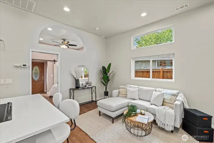 View into the living room of the DADU/Cottage. Hardwood floors extend throughtout the living space and bedroom.