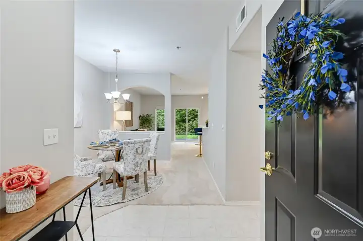 Step into the wide entry and take a look around. Just behind the front door you have a coat closet to keep you organized. Your new home as many updates like fresh paint, new carpet, new quartz counter tops in the kitchen and bathrooms, and all new appliances.