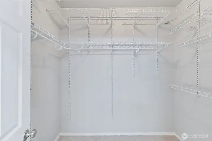 Another generously sized room...the walk-in closet. Organized for all your storage needs.