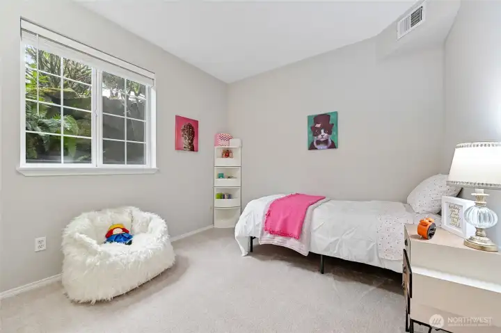 Now we come to the 2nd bedroom. Well sized space that can be utilized for just about anything you want/need. Large closet located behind where we would be standing. Second small closet in this room houses the water heater, which is 4 years young.