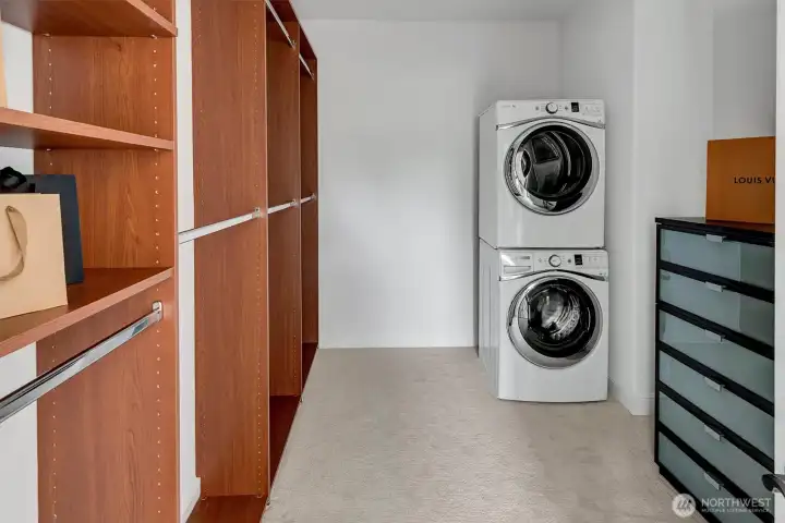 Owner's closet with second set of front loading washer/dryer!