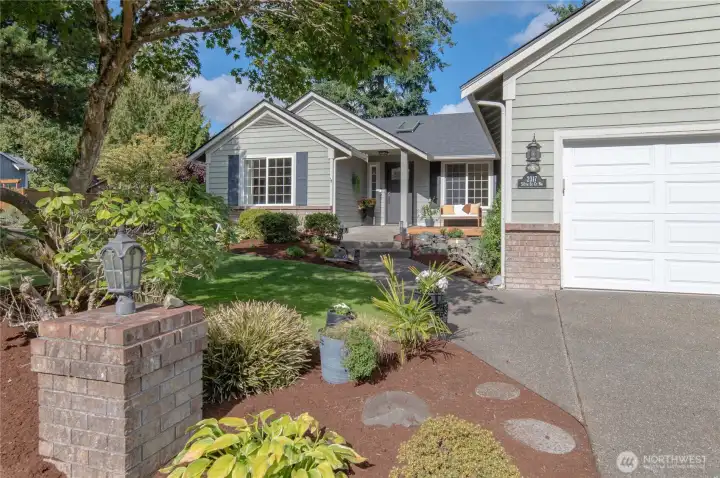 Ample parking for multiple vehicles in the driveway and 2 car garage.