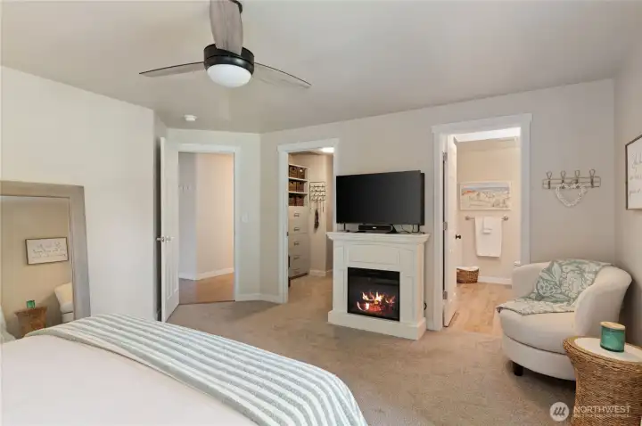 The Primary Suite includes a luxury bath and walk in closet with new closet organzing system.