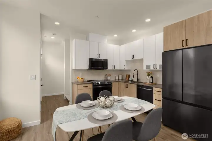 Every angle of this open-concept floor plan was designed to impress. Crisp lines, natural textures, and a subtle glow of daylight create a sense of calm sophistication that welcomes you home.